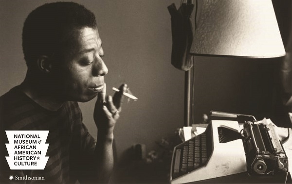 James Baldwin at typewriter