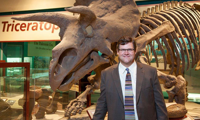Kirk Johnson with Triceratops