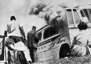 Greyhound bus carrying Freedom Riders is firebombed in Alabama.